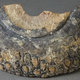A ceramic sherd that may have been part of an explosive.